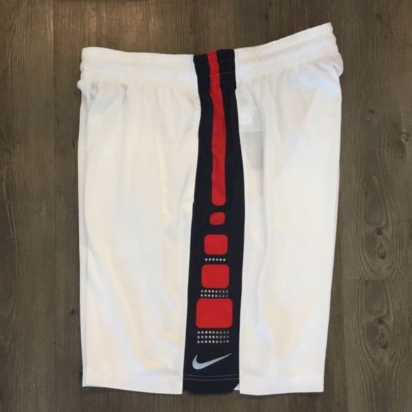 navy blue and red nike shorts